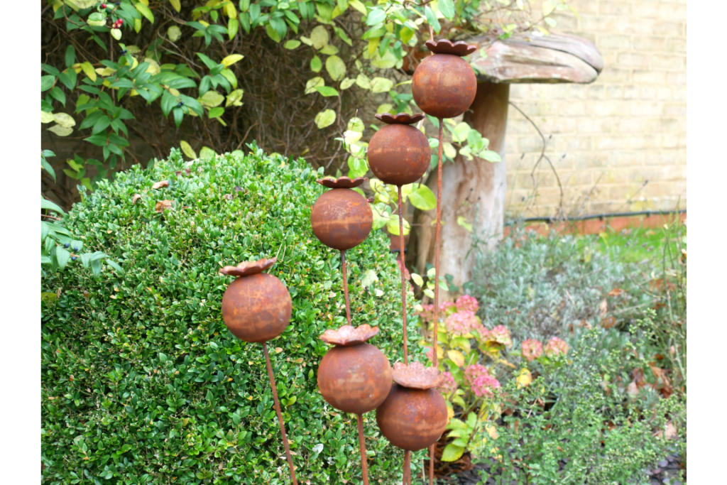 Rusty Metal Seven Head Poppy Garden Stake
